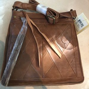 A tan lucky brand shoulder bag